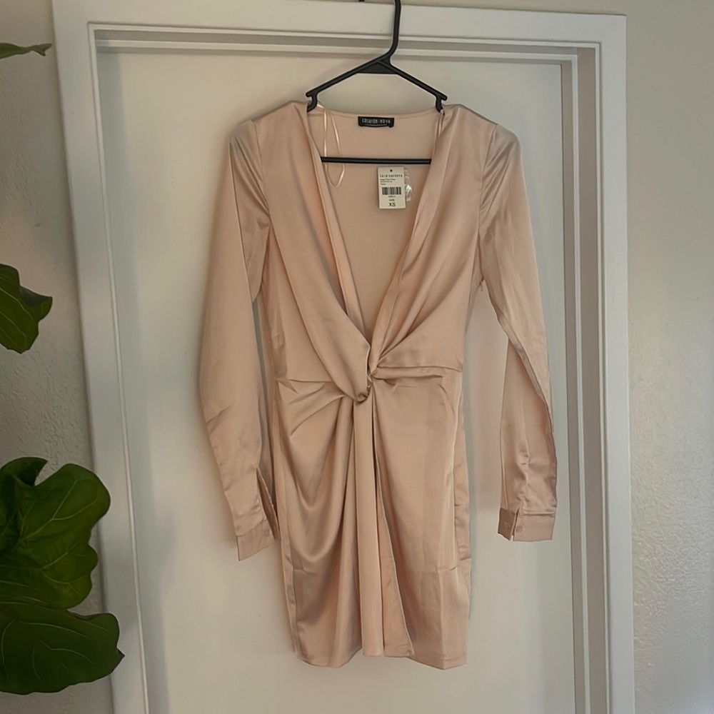Brand new with tags fashionnova mauve long sleeve slit mini dress.
